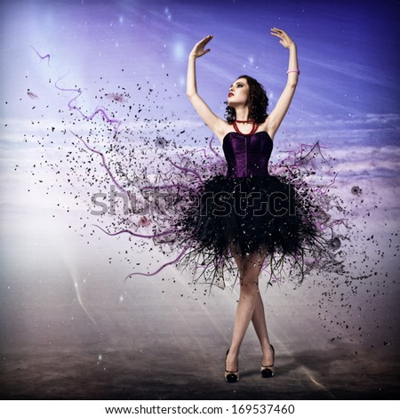 Young woman dancing for her abstract background
