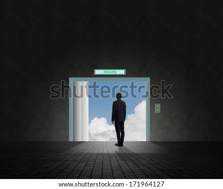 Business man standing near an open door, the door sky and clouds