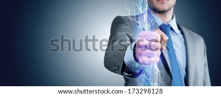 close-up of clasped hand, hand of lightning flashes and lights
