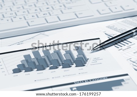 pen, successful growth charts and keyboard. business still life