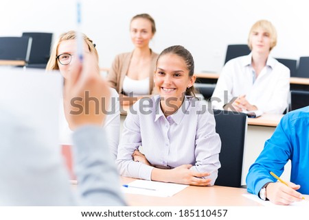 image of a students listen attentively to the teacher
