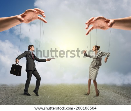 image of a two puppet businessman standing on against each other, concept of business control