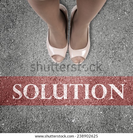 Close up of businesswoman feet standing at line