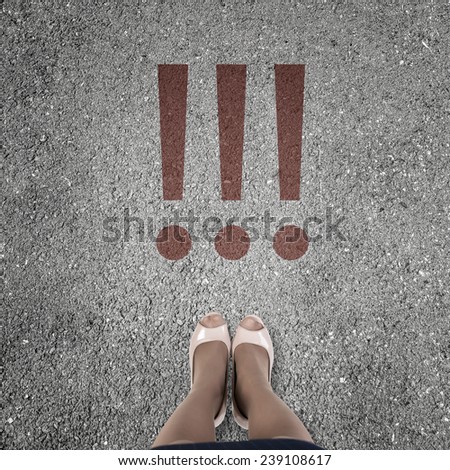 Top view of businesswoman feet standing at crossroads