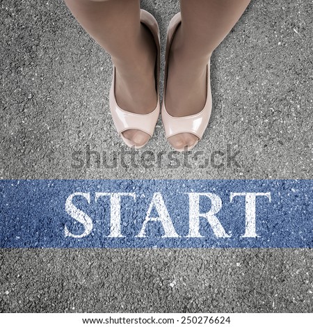Close up of businesswoman feet standing at line