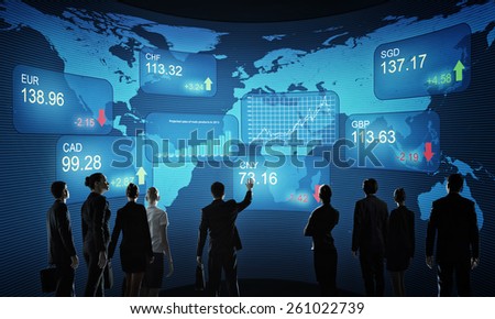 Group of business people standing with back against market background