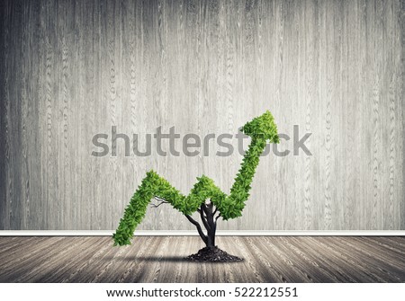Market growth and success as growing green tree in shape of arrow