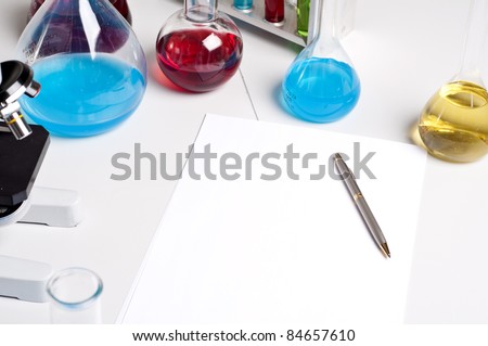 workplace employee lab,flasks with colored liquids, laboratory items