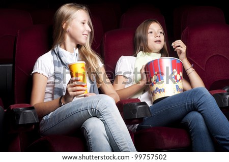 two girls look cinema