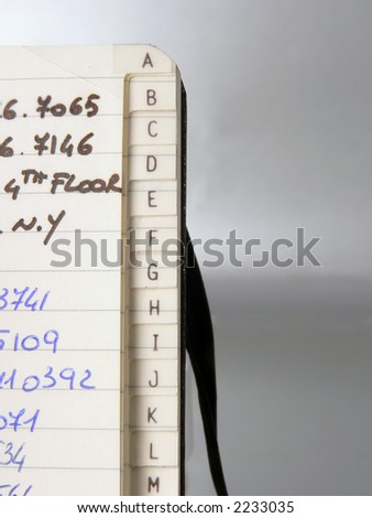index book on a gray background, business conceptual