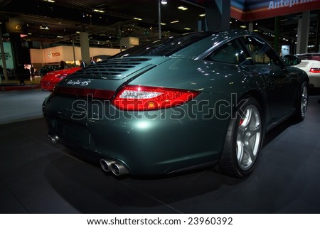 BOLOGNA, ITALY, 15 DECEMBER 2008:  The Porsche display with supercars and sport utility vehicles of the last generation at the Bologna Motor Show 2008 in Bologna, Italy, December 15, 2008.