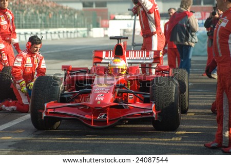 BOLOGNA,ITALY-06 DECEMBER 2008: Ferrari racing team simulate a classic pit stop at the 2008th edition of Motor Show in Bologna,Italy