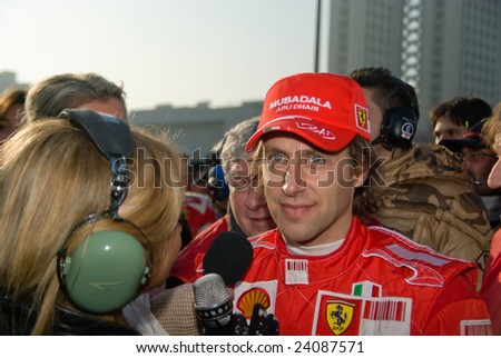 BOLOGNA,ITALY-06 DECEMBER: luca badoer ,ferrari\'s official test driver interviewed by television at the 2008 edition of Motor Show in Bologna,Italy
