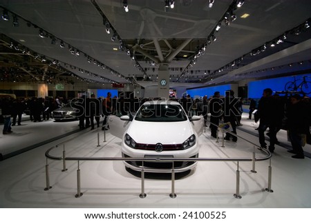 BOLOGNA, ITALY - DECEMBER 15: tuned volskwagen golf with italian flag color displayed at motor show on December 15, 2008 in Bologna, Italy.