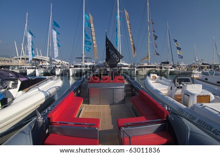 GENOA, ITALY - OCTOBER 7: the 50th edition of the annual boat\'s show. Here a fast a fast hard rubber dinghy with powefrful engine, 07 october 2010 in  Genoa  , Italy