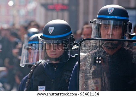 NICE, FRANCE - OCTOBER 16: French police control the street of nice during a  student  protest against school reform proposed by the french government, Nice the 16 of october 2010, France