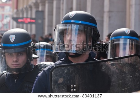 NICE, FRANCE - OCTOBER 16: French police control the street of nice during a  student  protest against school reform proposed by the french government, Nice the 16 of october 2010, France