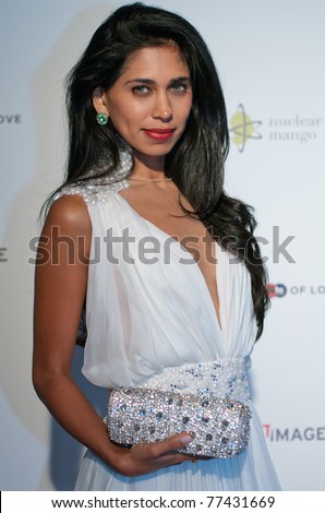 CANNES, FRANCE - MAY 17: British actress and designer  Fagun Thakrar (bag by Fagun Collection) attends the \