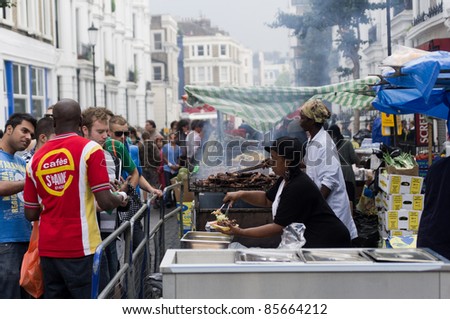 LONDON, ENGLAND - AUGUST 28: Food\'s stall at the Notting Hill Carnival on August 29, 2011 in London, England.