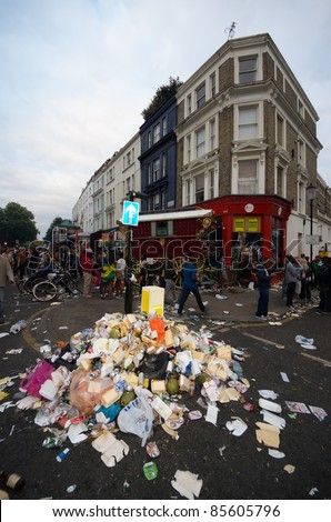 LONDON - AUG 29: garbage is left in the street at the end the Notting Hill Carnival on August 29, 2011 in London, England.