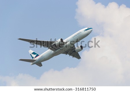 HONG KONG - August 10: Cathay Pacific Boeing 777 departure from Hong Kong International Airport on August 10, 2013 in Hong Kong. Cathay Pacific is the international flag carrier of Hong Kong.