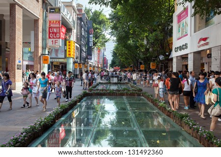 CANTON, CHINA - SEPTEMBER 06: The Beijing Road in Guangzhou on SEPTEMBER 06,2012. Famous shopping street with many shops and restaurants was reconstructed - stock photo