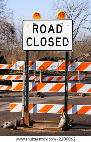 Road closed construction warning sign
