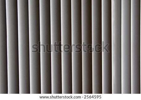 Back lit sliding patio door vertical window shades for background (rough texture of blinds visible when viewed larger than thumbnail)