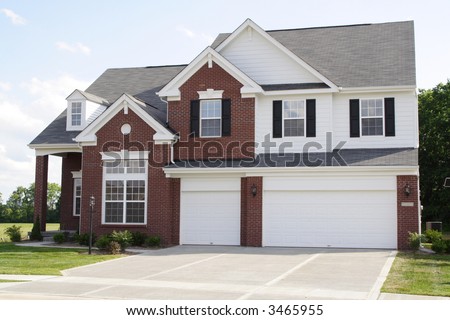 New 2 story brick home with 3 car garage