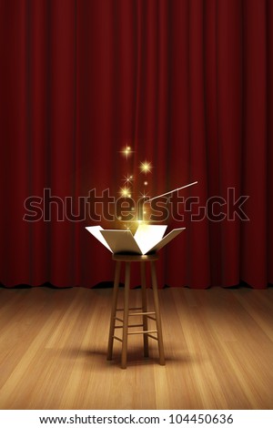 Magic box opened on stool in spotlight on stage of the theater