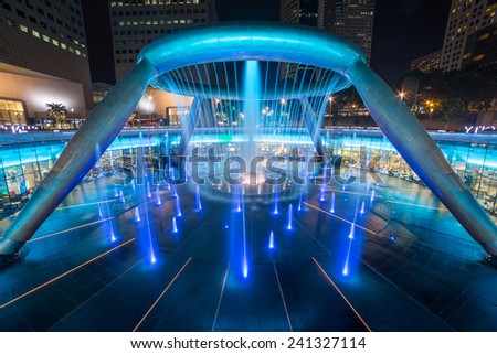 SINGAPORE -Dec 26 Fountain of Wealth in dusk , landmark of Singapore night  on Dec 26, 2014