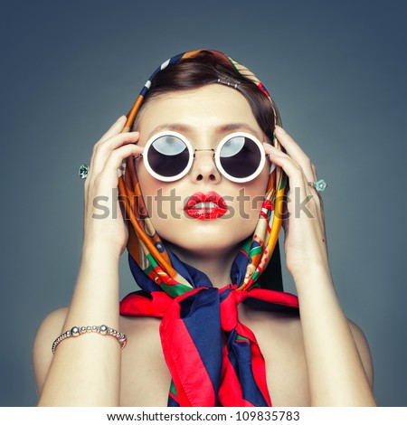 The square image of a girl in retro handkerchief The square image of a girl in retro handkerchief