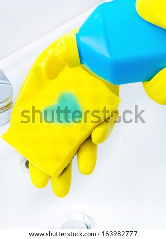 sponge with dish washing liquid