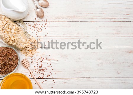 The concept of cooking oatmeal with flax seeds. Background.