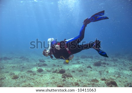 black scuba divers