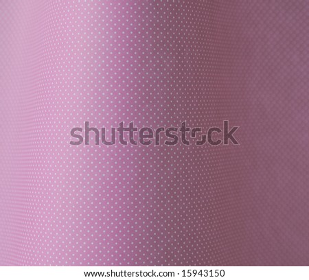 white polka dots on a curved pink background