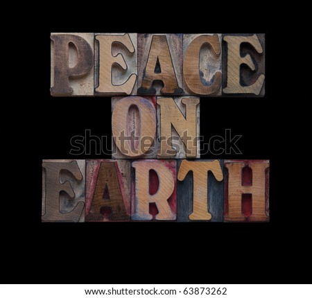 the words peace on earth isolated on black