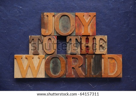 the words joy to the world in old wood type