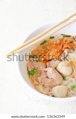 Thai food.noodle soup with fish ball and pork.