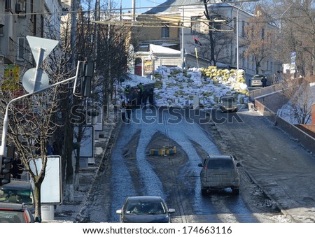 KIEV, UKRAINE - FEBRUARY 02 2014: Barricade is made in the central street of the Ukrainian capital KIEV, UKRAINE - FEBRUARY 02 2014.