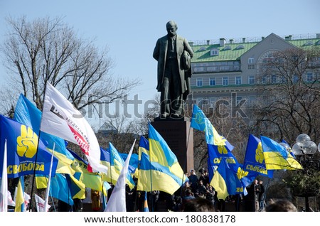 KIEV, UKRAINE - 09 MARCH 2014: Maidan activists, officials, diplomats and common people take part in the solemn ceremony in the Taras Shevchenko\'s public garden of KIEV, UKRAINE - 09 MARCH 2014.