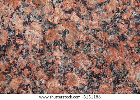 Granite stone red black background textured