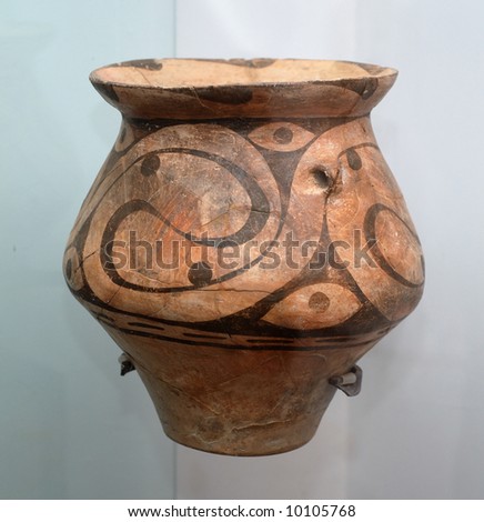 Ancient clay jug with black ornamental pattern and accessories, priceless archeological find of famous Tripolsk culture