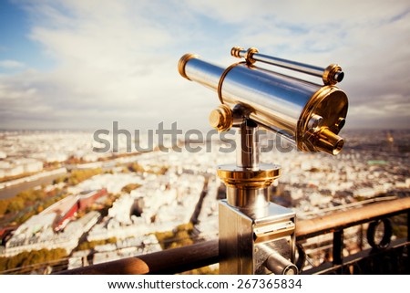 binoculars telescope and view on Paris