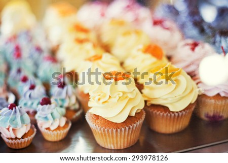 cupcakes with yellow and blue cream