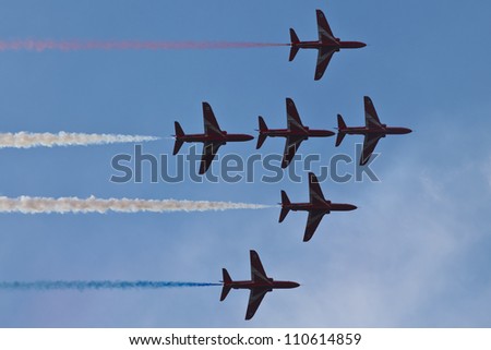 ZHUKOVSKIY, RUSSIAN FEDERATION - AUGUST 11: Royal Air Force Aerobatic Team in formation on 100 Years Air Force Celebration on August 11, 2012, Zhukovskiy, Russia.