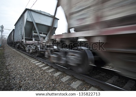 The cargo train moving with a high speed