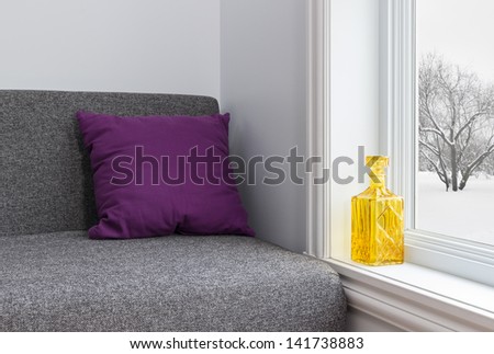 Room With Bright Decor And View Over Winter Landscape.