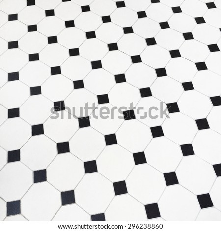 Close-up of black and white ceramic tiles floor.