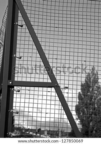 A metal image in black and white taken in a way to make it look like a letter A. The image was shot at day time with a ISO of 100 , shutter speed 1/125 and f stop of 22 to give the image a sharp look.